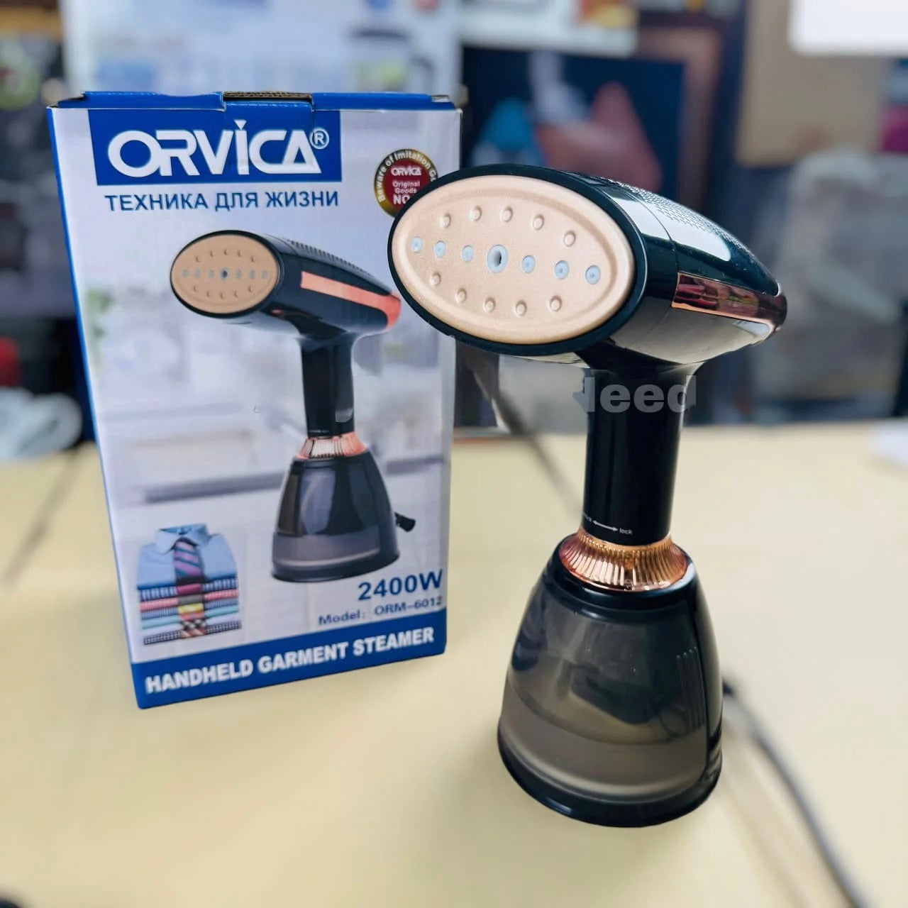 ORVICA hand held multi garment steamer